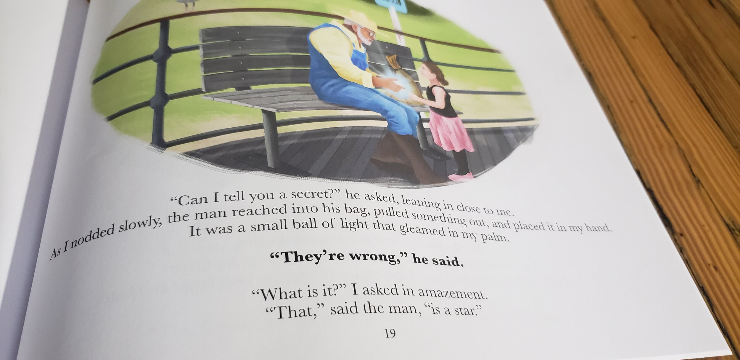 Picture page with illustration and text. The illustration is a realistic watercolor style image of an older man handing a shining start to a little girl. The text is aligned below and “They’re wrong, he said.” is in a bold typeface.
